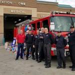 Firefighters bring holiday cheer