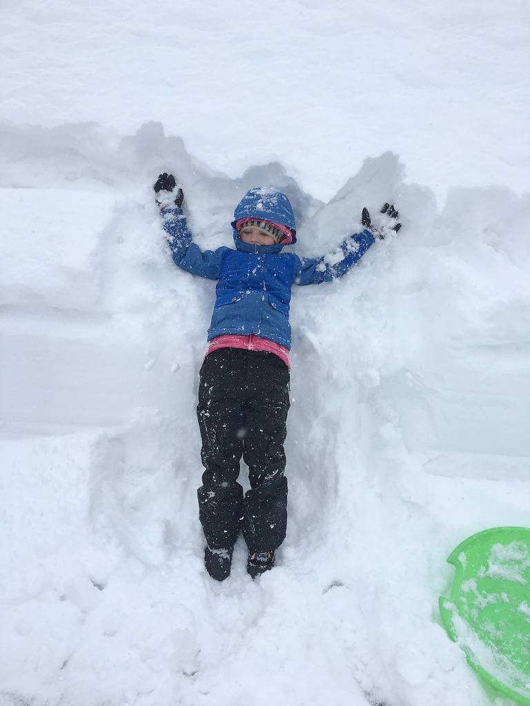 Grace Swaney, 7, makes a snow angel during a recent visit to Mount Baker. (Aaron Swaney)