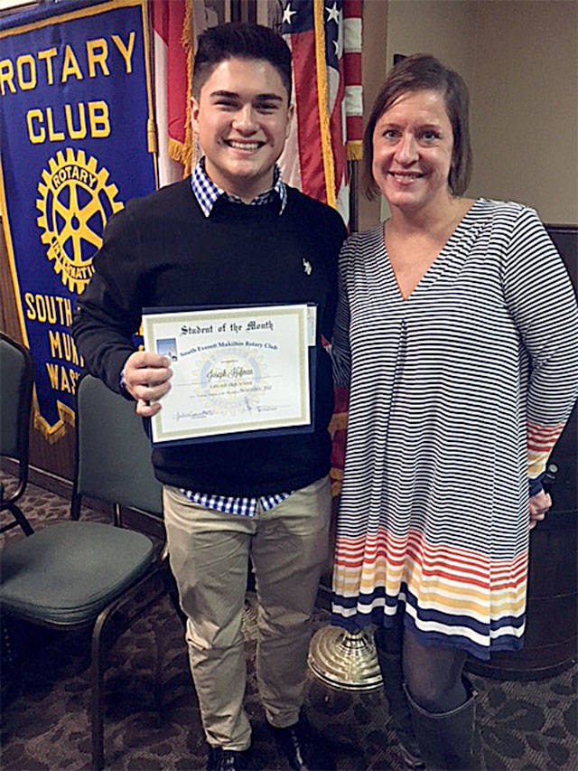South Everett-Mukilteo Rotary Club President Julie Frauenholtz (right) congratulates Cascade High Schools Joe Hofman on being named a Student of the Month. (Contributed photo)