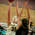 Shorecrests Audrey Dietz (35) takes a shot as Lynnwoods Rachel Walsh (3) defends during a game at Mountlake Terrace High School on Tuesday, Feb. 13. (Ian Terry / The Herald)