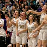 Lake Stevens players celebrate a late score during the 4A district championship game against Glacier Peak on Feb. 15, 2018, at Everett Community College. (Kevin Clark / The Herald)