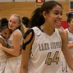 Lake Stevens celebrates their win over Glacier Peak for the 4A district championship Thursday night at Everett Community College in Everett on February 15, 2018. (Kevin Clark / The Daily Herald)