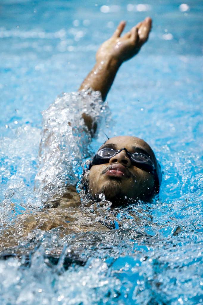 Jacksons Ian Walsh swims to victory in the 50-yard adaptive swim backstroke event Saturday at the 4A state boys swimming and diving championships at the King County Aquatic Center in Federal Way. (Ian Terry / The Herald)