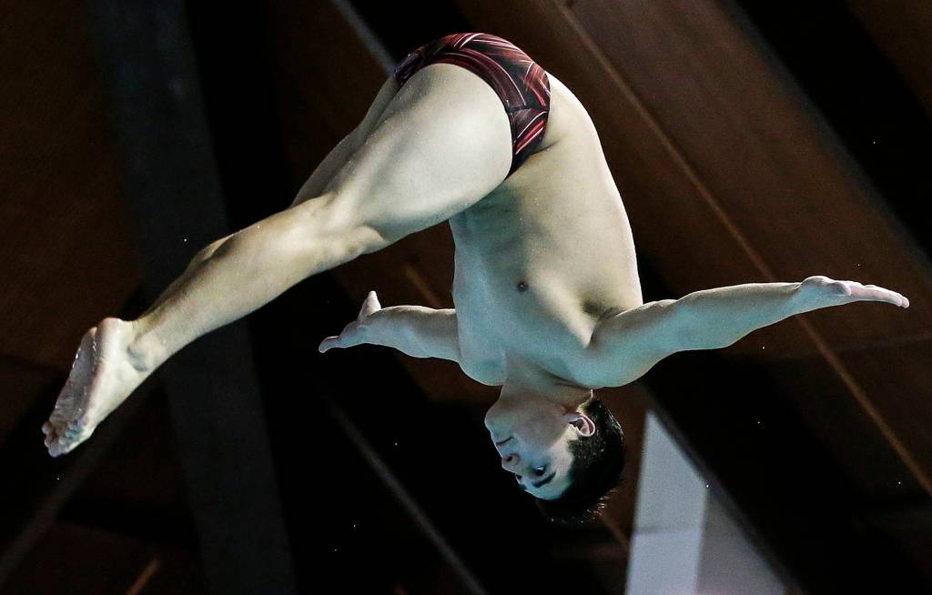 Cascade High School junior Joseph Hofman practices Feb. 14 at the Forest Park Swim Center in Everett. <strong><a href="https://www.heraldnet.com/sports/cascade-junior-is-at-home-on-the-diving-board/" target="_blank"></a></strong>(Ian Terry / The Herald)