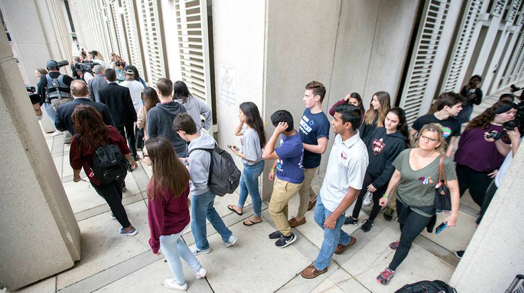 Survivors from the fatal shooting at Marjory Stoneman Douglas High School arrive at the Florida Capitol in Tallahassee on Wednesday. (AP Photo/Mark Wallheiser)