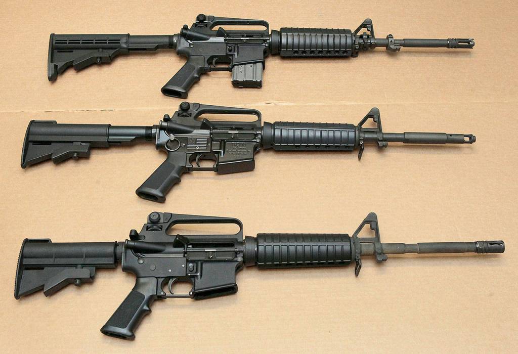 Three variations of the AR-15 assault rifle are displayed at the California Department of Justice in Sacramento. (AP Photo/Rich Pedroncelli,file)