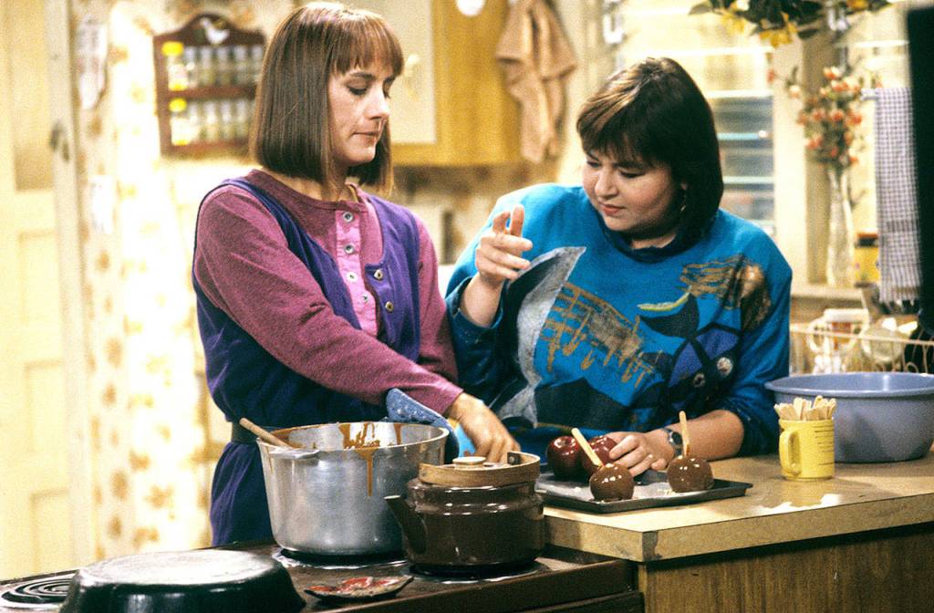 Laurie Metcalf, left, and Roseanne Barr in an episode of the original comedy series Roseanne. Metcalf won three Emmys for her portrayal of Roseannes sister on the show. (Photo courtesy of ABC)