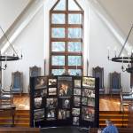 Jeremiah Chapman of Hillsborough, N.C., sits in a pew inside the chapel at the Billy Graham Training Center at the Cove to view a memorial display in honor of Graham on Wednesday, Feb. 21, 2018 in Asheville, NC. Graham, the worlds best-known evangelist, died at his home in Montreat, N.C. on Wednesday, his organization said. He was 99. (AP Photo/Kathy Kmonicek)