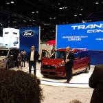 Comic actor, singer, musician and Chicago native Jim Belushi (center left) participated in Fords presentation of the 2018 Transit Connect Passenger Wagon at the Chicago Auto Show. (Mary Lowry / For The Herald)