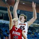 Stanwoods Trygve DeBoer (40) takes a shot as Eastside Catholics Griffin Barker (45) defends during a boys 3A state tournament game at the Tacoma Dome on Wednesday, Feb. 28. Eastside Catholic went on to defeat Stanwood 63-37. (Ian Terry / The Herald)