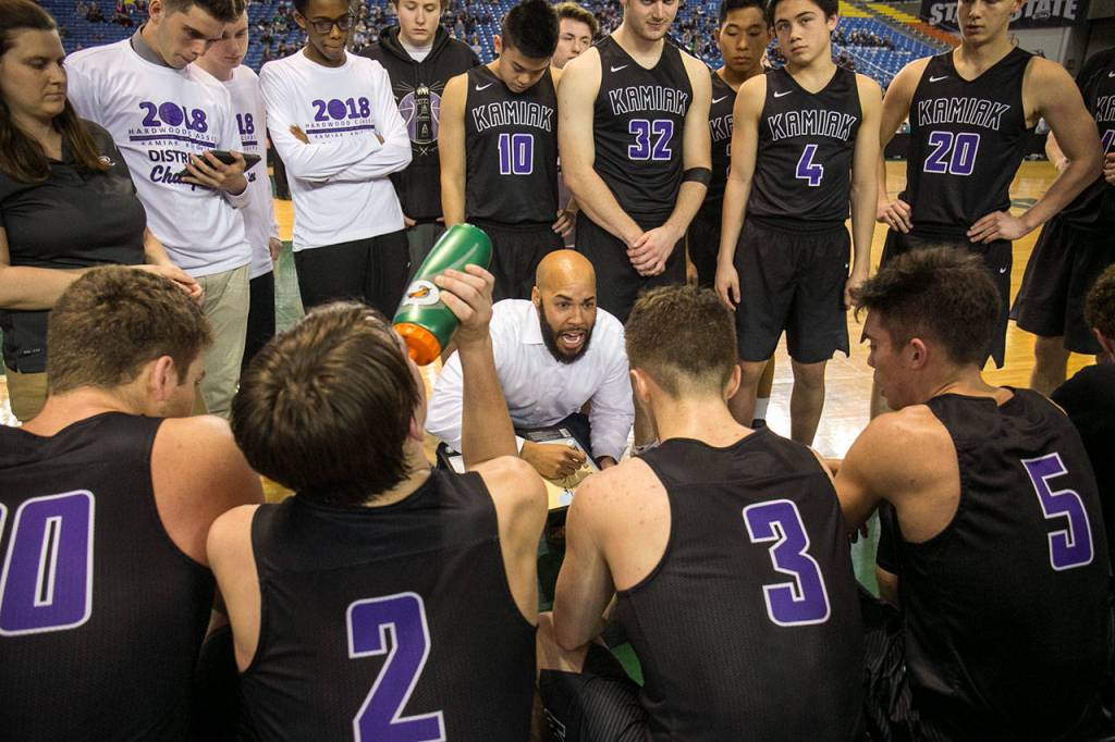 Kamiak head coach Corey West addresses his team during a timeout against Union in the 4A Hardwood Classic on Feb. 28, 2018, at the Tacoma Dome. (Kevin Clark / The Herald)