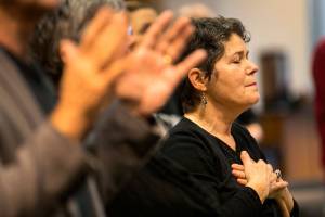 Anne Williams during service of Refuge Foursquare Church Sunday morning at Everett Station in Everett on February 4, 2018. (Kevin Clark / The Daily Herald)