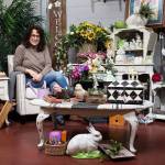 Nicolette Sigler is surrounded by items she will bring to the Everett Home Garden Show. The show will be at the Angel of the Winds Arena from March 9-11. (Andy Bronson / The Herald)