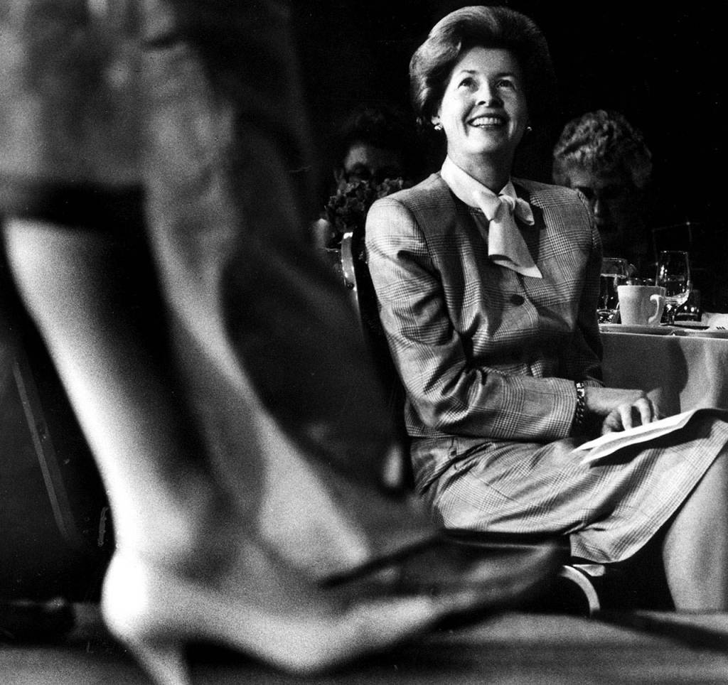 Helen Jackson enjoys a fashion show in March of 1989. (Drew Perine/ Herald File)