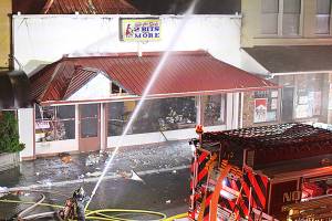 Lot where business burned still empty, but owners have dreams