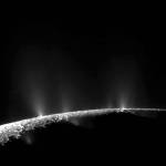 A plume of water ice and vapor is seen in the south polar region of Saturns moon Enceladus. (NASA)