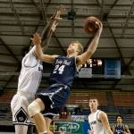 Glacier Peaks Evan Mannes attempts a shot with Skyviews Samaad Hector during the WIAA state basketball tournament Wednesday at the Tacoma Dome in Tacoma on February 28, 2018. (Kevin Clark / The Daily Herald)