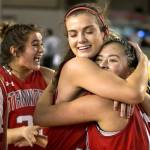 Stanwood celebrates their win over Lincoln to advance to the semifinals in the WIAA state basketball tournament Wednesday at the Tacoma Dome in Tacoma on March 1, 2018. (Kevin Clark / The Daily Herald)