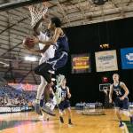 Glacier Peaks Trey Lawrence attempts a shot with Skyviews Samaad Hector defending during the WIAA state basketball tournament Wednesday at the Tacoma Dome in Tacoma on February 28, 2018. (Kevin Clark / The Daily Herald)