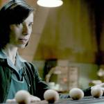 A mute cleaning woman (Sally Hawkins) offers hard-boiled eggs to the fish-man (Doug Jones) shes befriended in Guillermo del Toros The Shape of Water. (Fox Searchlight Pictures)