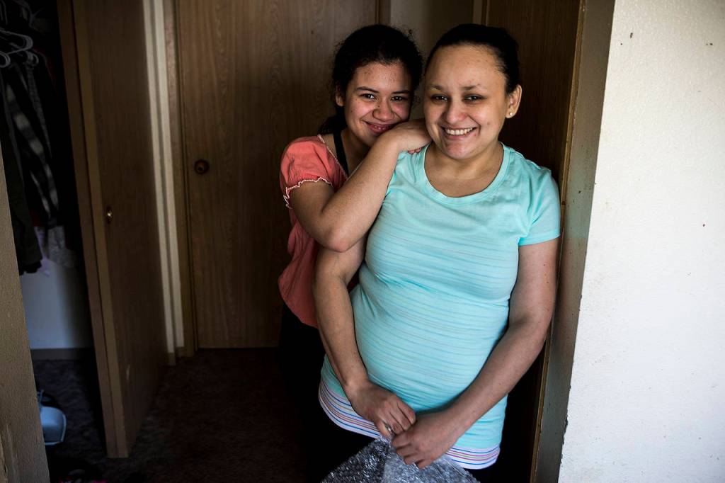 Bernarda Pineda (right) and her oldest daugher, Sherly Alvarado-Pineda, 14, whom she carried into the U.S. with her 12 years ago fleeing violence, will be split apart when Bernarda is deported to Honduras on March 19. (Ian Terry / The Herald)