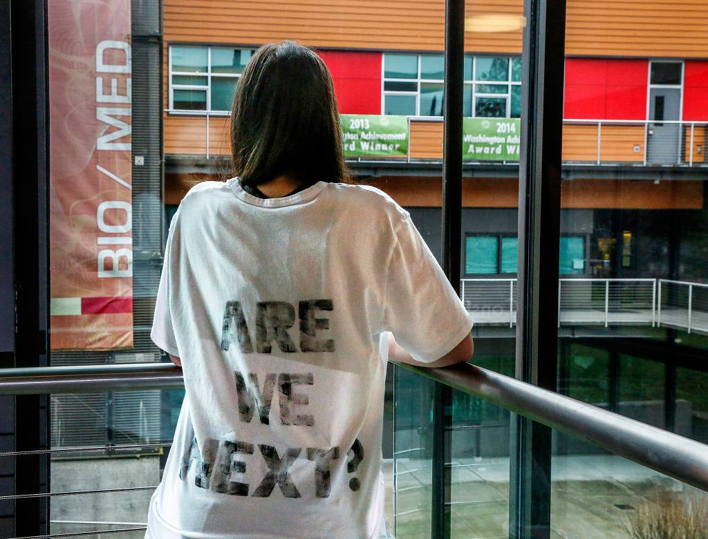 Marysville Getchell High School junior Bailey Thoms created white T-shirts with messages front and back. The front is a graphic image of a target. Thoms organized a march for March 3 to call for gun control and an end to school shootings. (Dan Bates / The Herald)