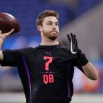 Former Washington State quarterback Luke Falk throws during a drill at the NFL scouting combine in Indianapolis on Saturday. (AP Photo/Michael Conroy)