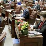 On final day, lawmakers look to pass budget, property tax cut