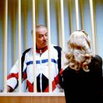Sergei Skripal speaks to his lawyer from behind bars in Moscow in 2006. (AP Photo/Misha Japaridze, File)
