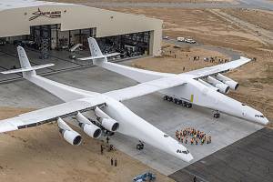 Paul Allens Stratolaunch airplane emerges from its hangar in Mojave, Calif., on May 31. MUST CREDIT: Courtesy of Stratolaunch Systems Corp.