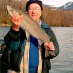 Wayne Kruse displays a freshly-caught Steelhead trout on Dec. 27, 2005. (Photo courtesy of Wayne Kruse)