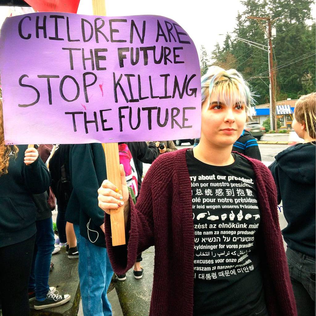Sophomore Madison Speach walked out Wednesday at Scriber Lake High School in south Snohomish County. (Rikki King / The Herald)