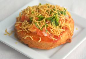 Make a gold coin for St. Patricks Day. Its bread cut into the shape of a coin, stuffed with mashed potatoes, battered and fried. (Reshma Seetharam)