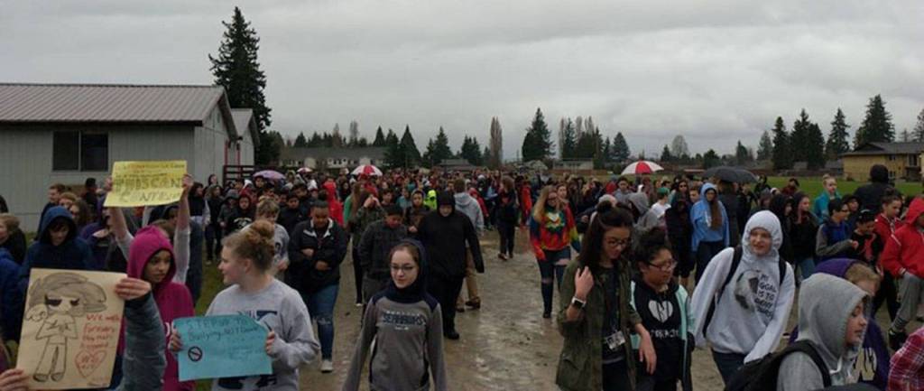 Students march outside of Marysville Middle School during a walkout honoring the 17 lives claimed during a Feb. 14 shooting at a high school in Florida. (Jake Martin)