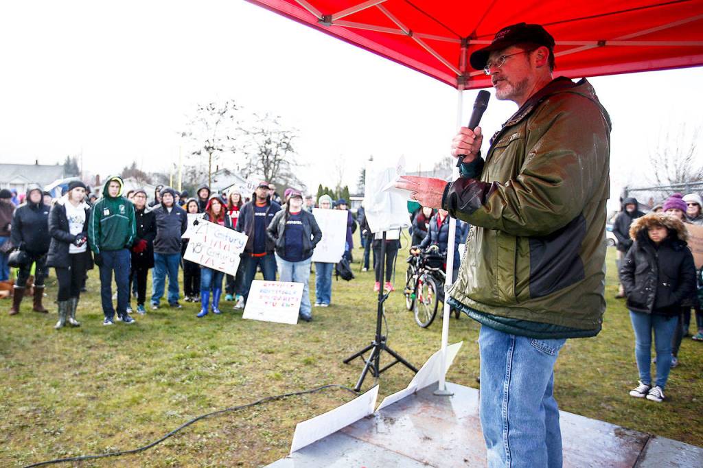 Marysville Pilchuck teacher Jim Strickland speaks at a March for Our Lives rally at the Asbery Athletic Fields in Marysville on Saturday. (Ian Terry / The Herald)