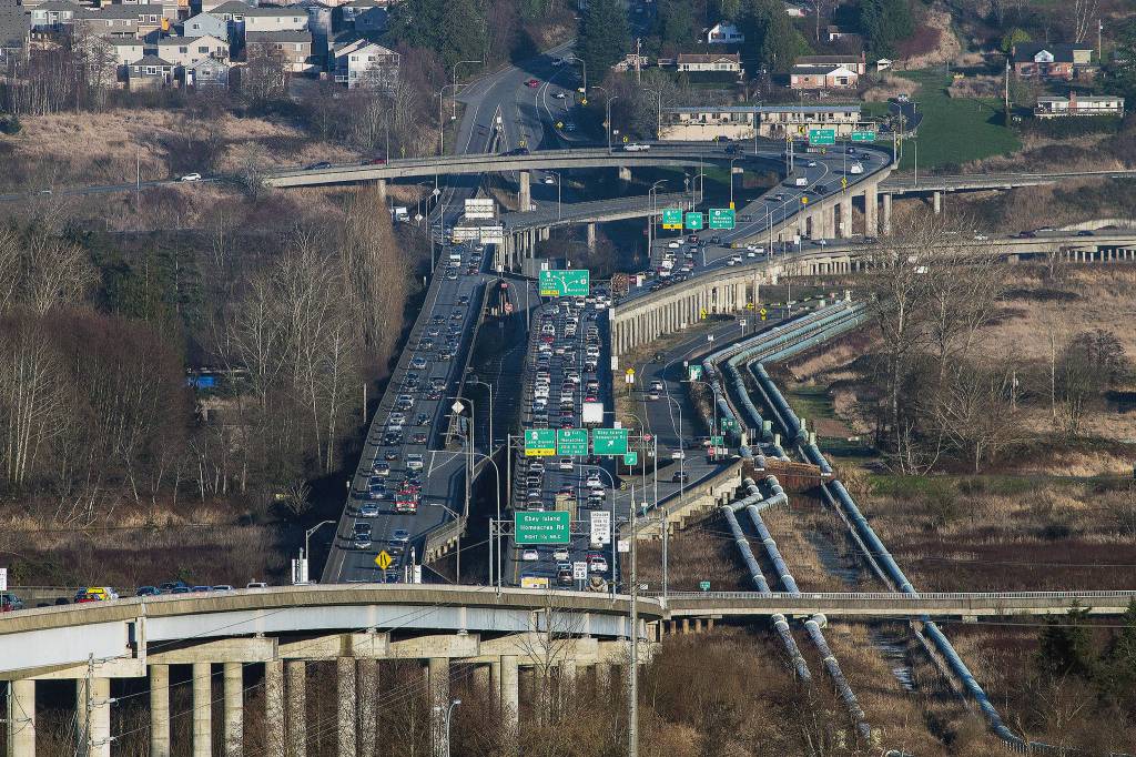 Looking east toward the U.S. 2 trestle as cars begin to backup on March 1 in Everett. (Andy Bronson / The Herald)