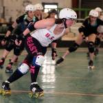 Lacey Ramon skates laps around the rink during Rat City Roller Girls practice Sunday in Shoreline. Ramon helped the United States win the gold medal at the World Cup earlier this month. (Kevin Clark / The Herald)