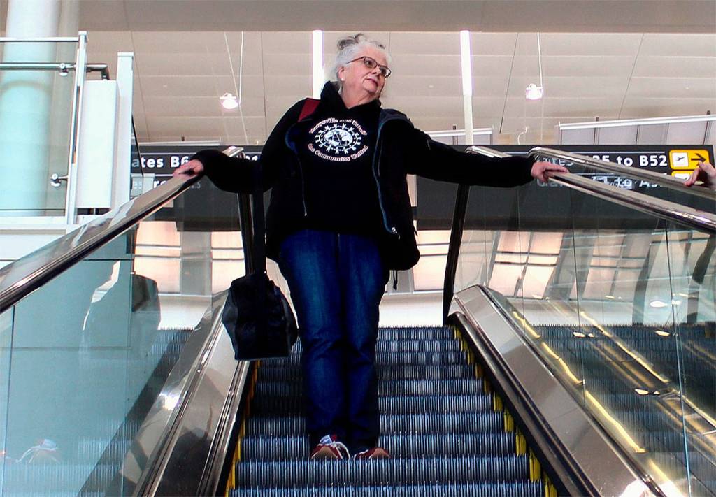 Marysville Getchell High School history teacher Marjorie Serge makes her way through the Minneapolis Airport on her way to Washington, D.C., as a chaperone. (Photo courtesy Jocelyn van der Put)