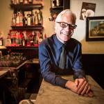 At Daphnes in downtown Edmonds, bartender Desmond van Rensburg fills the 250 square foot haunt with cheer, laughter and expertly-crafted cocktails. The intimate space encourages patrons to talk with each other and mingle between groups. (Ian Terry / The Herald)