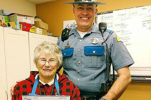 Trooper donates award to food bank