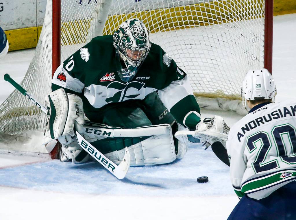 Everetts Carter Hart eyes the puck Tuesday during a playoff game at ShoWare Arena in Kent. (Ian Terry / The Herald). (Ian Terry / The Herald)