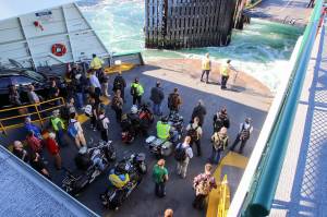 Passengers await docking a ferry on the Mukilteo-Clinton run. (Kevin Clark / The Herald)