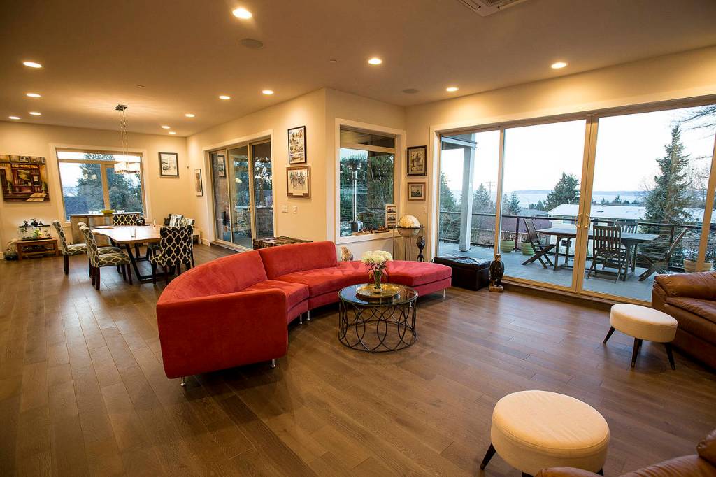  The Arguelles familys Edmonds home has seven Amazon Echo devices built in, which allows for features like light switch control and music playing with simple verbal commands. (Ian Terry / The Herald)