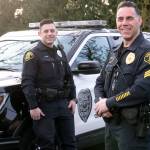 Officer Jordan Correa (left) is a member of the Lynnwood Police Department with his dad, Sgt. Al Correa. (Kevin Clark / The Herald)