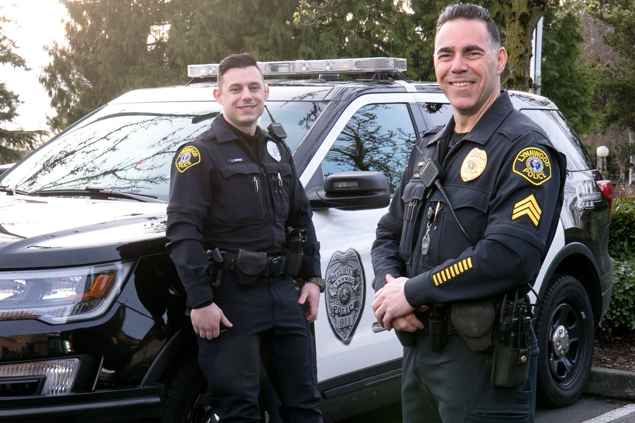 Officer Jordan Correa (left) is a member of the Lynnwood Police Department with his dad, Sgt. Al Correa. (Kevin Clark / The Herald)