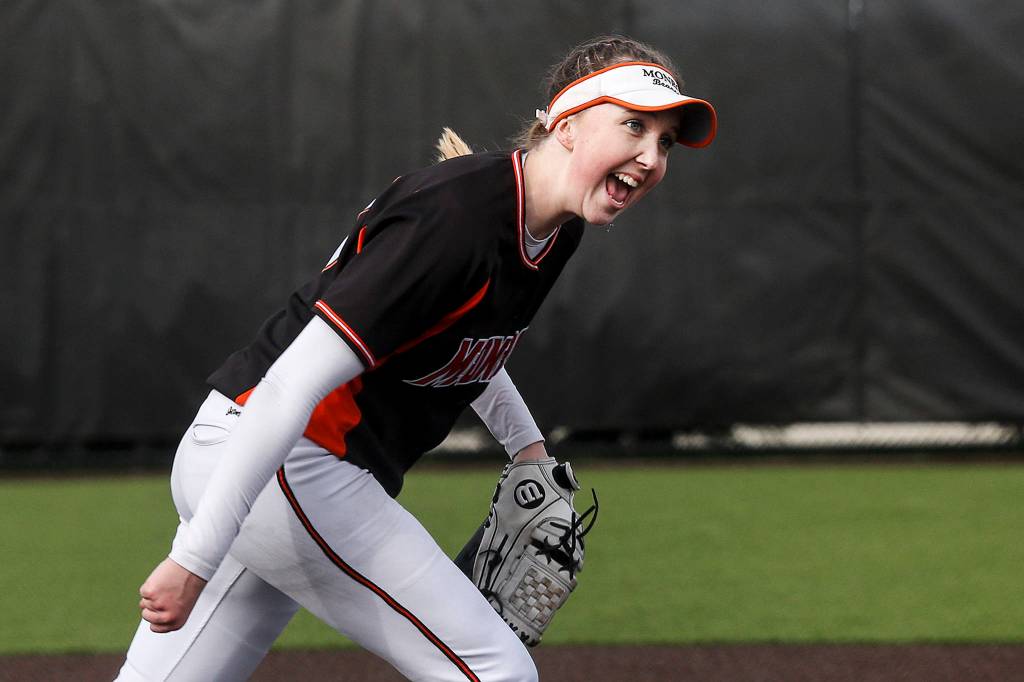 Monroes Cassidy Conrad celebrates a strikeout during a game against Jackson at Monroe High School on March 30. (Ian Terry / The Herald)