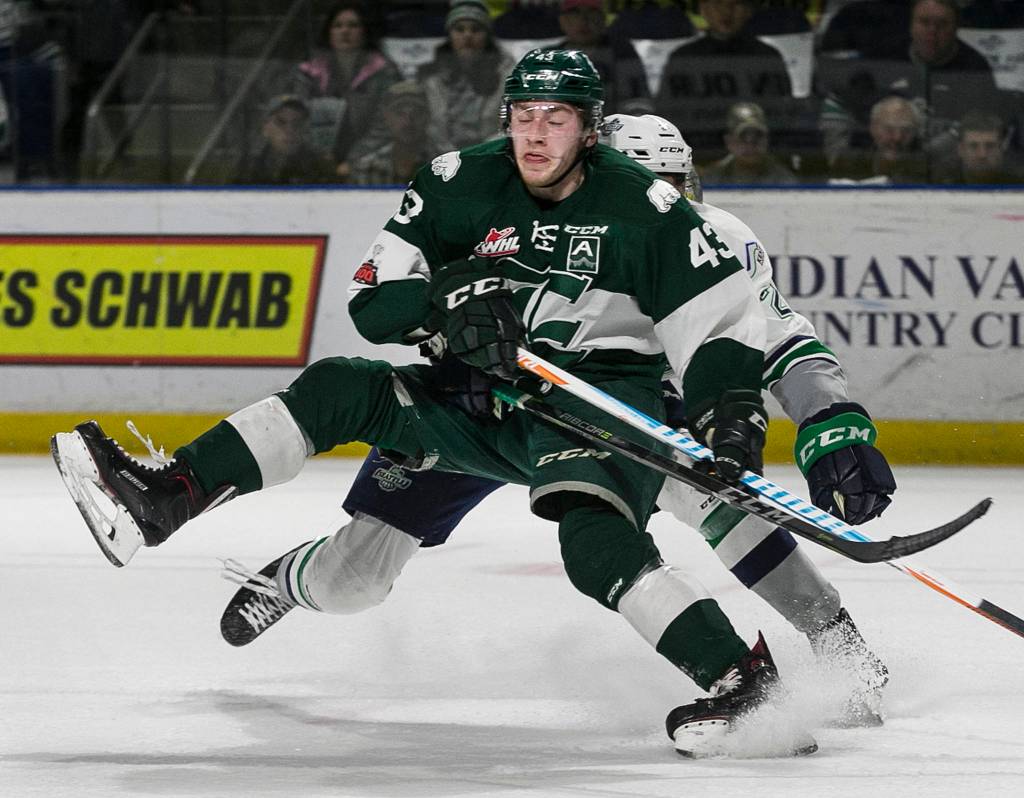 Everetts Connor Dewar is fouled by Seattles Matthew Wedman, setting up a penalty shot and goal at The accesso ShoWare Center in Kent on March 30. (Kevin Clark / The Herald)