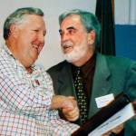 Bill Prochnau (right) received an Everett Junior College Distinguished Alumnus Award from then-Herald Publisher Larry Hanson at the colleges Grand Reunion in August 1997. Prochnau, a renowned journalist and author, died March 28 in Washington, D.C. (Photo courtesy Larry ODonnell)