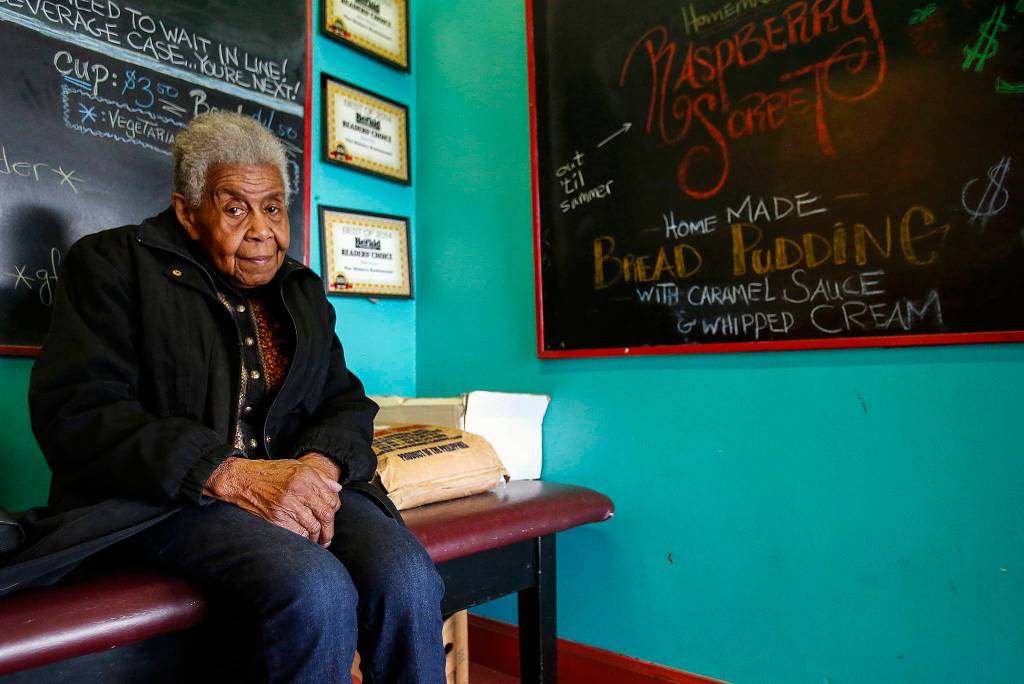 Marian Harrison, 87, pictured here at Everetts Sisters Restaurant, has been a delegate at two national Democratic conventions, including in 2012 when she heard President Barack Obama speak. She and others shed light on the 50th anniversary of the assassination of the Rev. Martin Luther King Jr. (Dan Bates / The Herald)