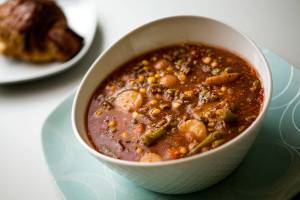 Hearty soup with green beans, peas, corn, ground beef, carrots, onions, beef broth, tomatoes and potatoes. Shot on Tuesday, April 10, 2018 in Everett, Wa. (Andy Bronson / The Herald)